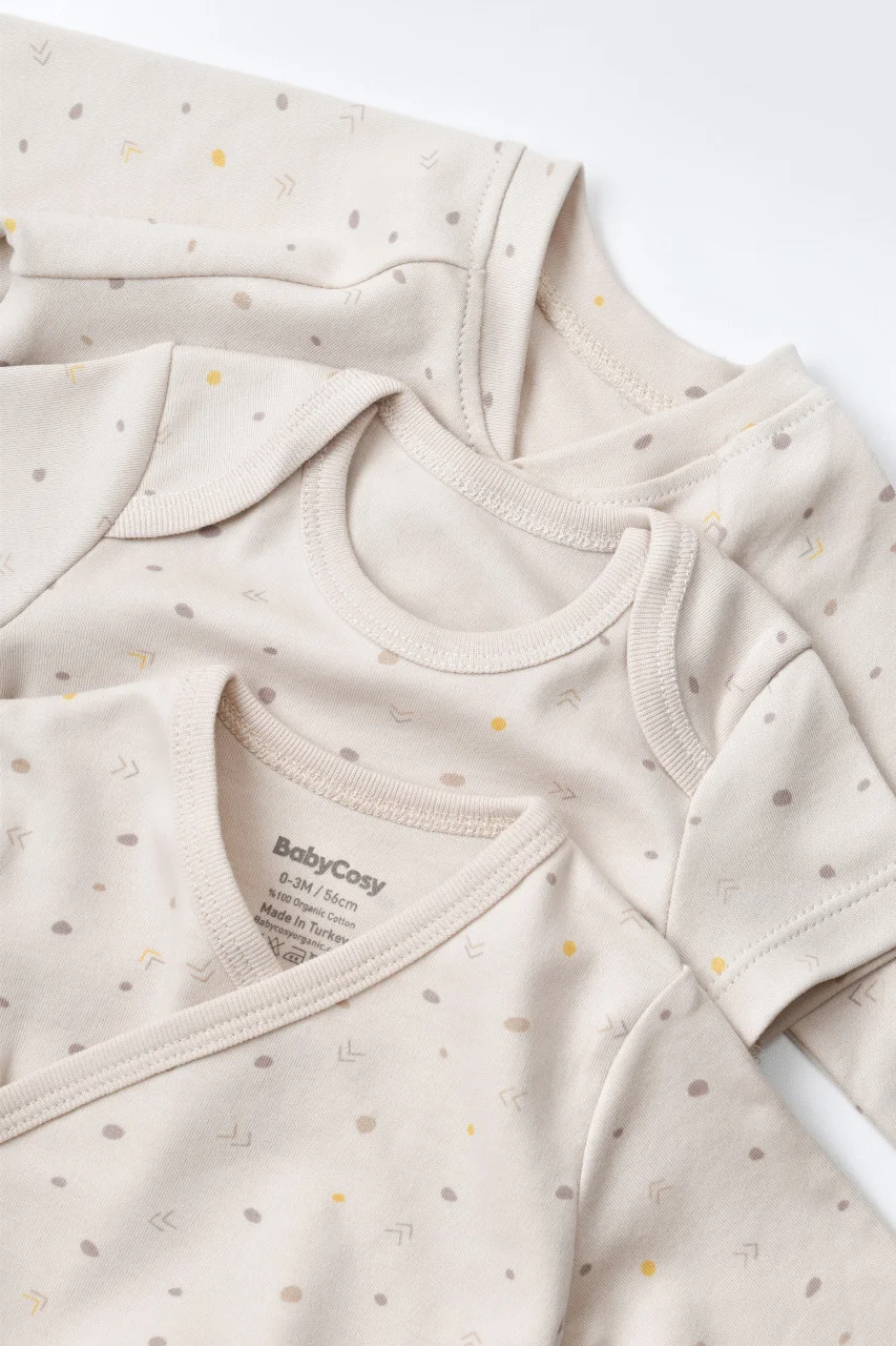 set-de-10-piese-pentru-nou-nascut-100-bumbac-organic-crem-cu-buline7400