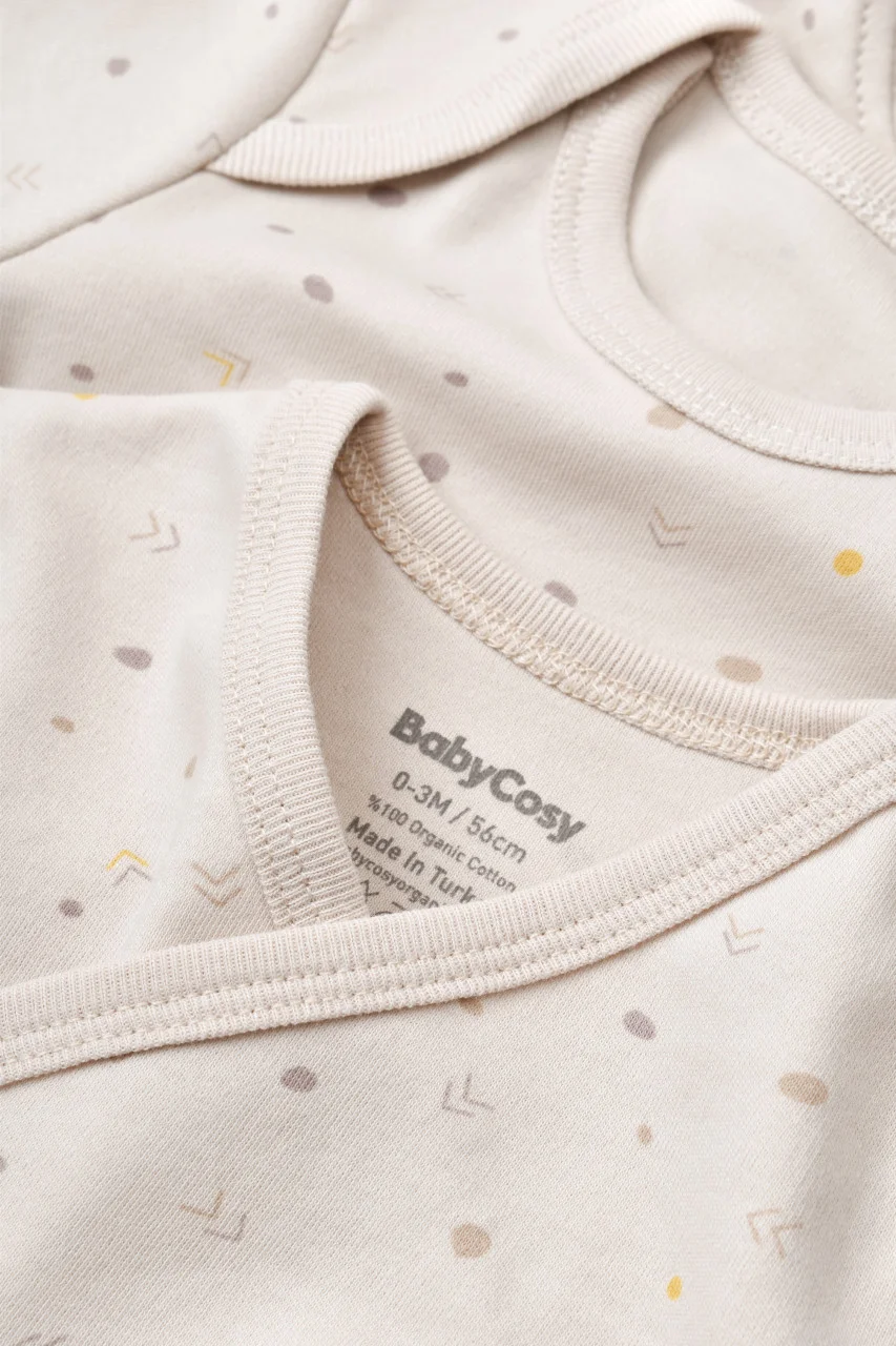 set-de-10-piese-pentru-nou-nascut-100-bumbac-organic-crem-cu-buline7403